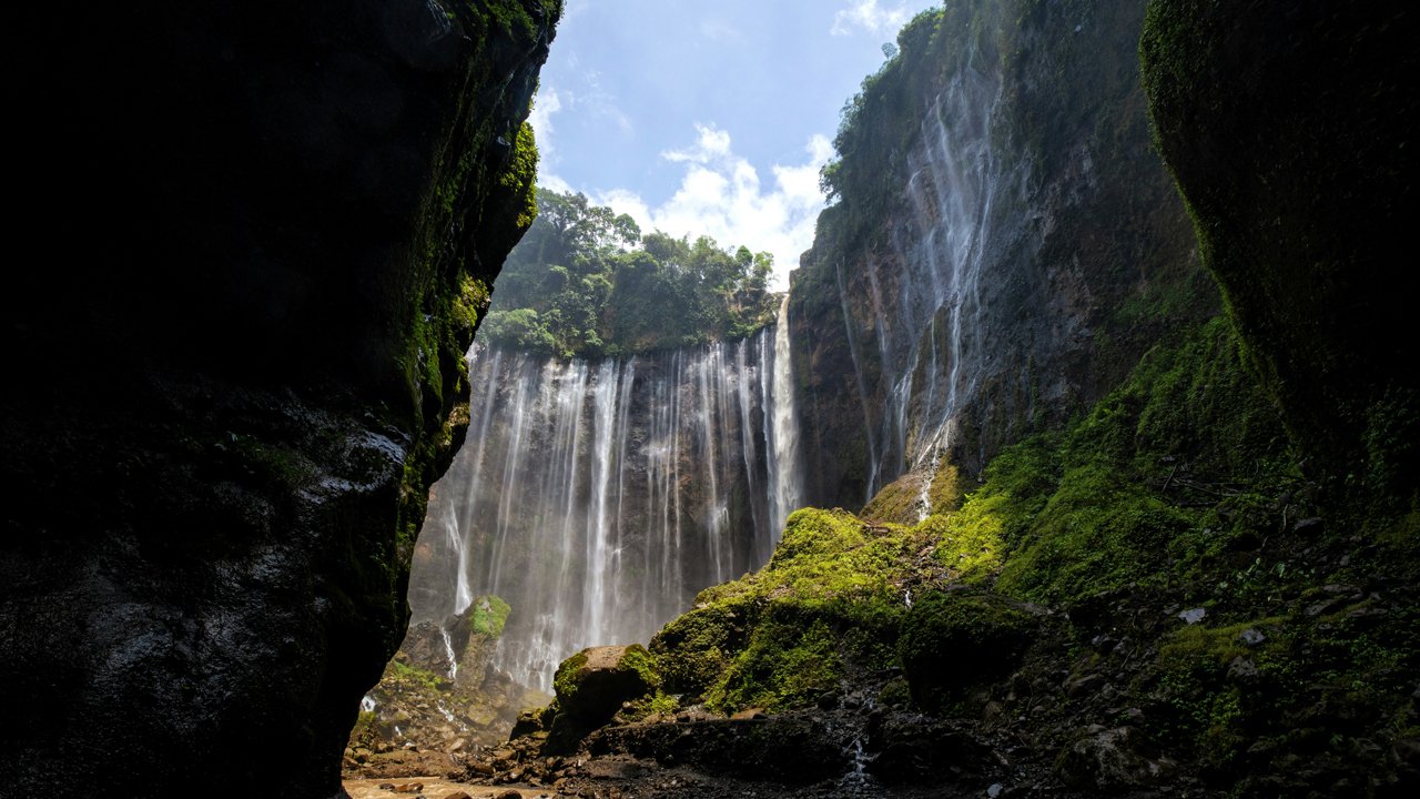 Experience the Magic of East Java: Tumpak Sewu, Goa Tetes, and Kapas Biru Adventure